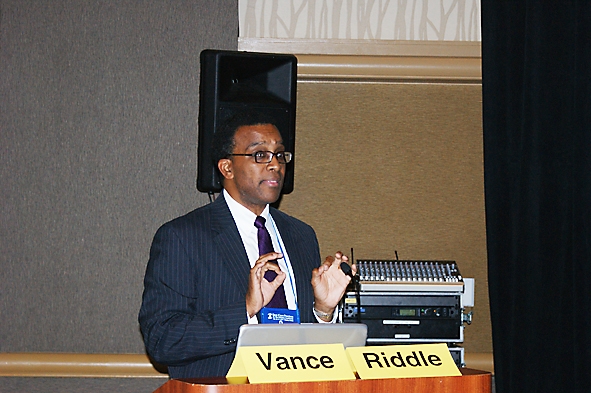 DSC03574.jpg - Speaker Dr. Albert Riddle discusses AMDA’s clinical practices guidelines.