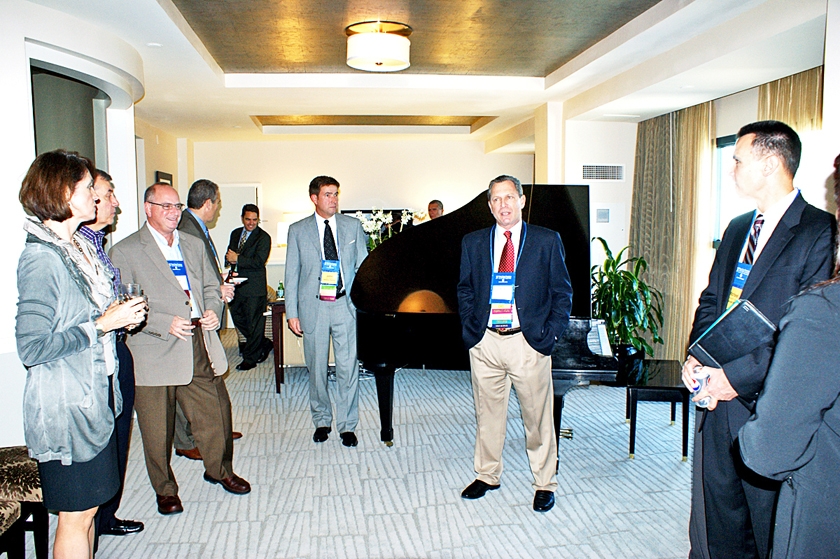 DSC03643.JPG - IAB Chairman Dr. Steve Selznick addresses the reception guests with Co-chair John Maddox looking on (to Dr. Selznick‚Äôs right).