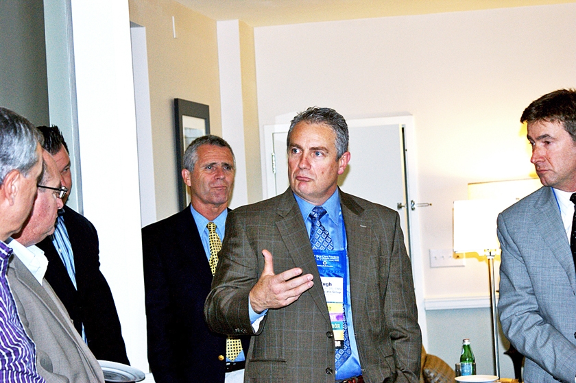 DSC03656.JPG - FMDA President Hugh Thomas (center) addresses the IAB reception guests.