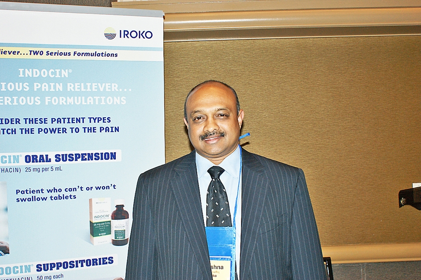 DSC03709.JPG - Exhibitor Krishnaraj Ariyapadi with Iroko Pharmaceuticals