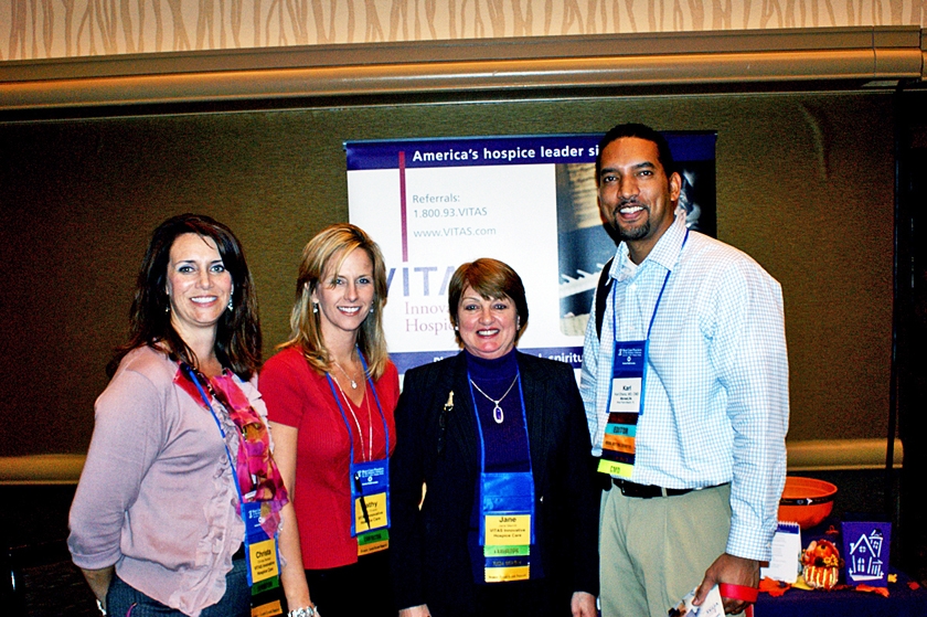 DSC03715.JPG - Exhibitors Christa Roman (from left), Kathy Evans, and Jane Merritt of Vitas Innovative Hospice with FMDA Director Dr. Karl Dhana