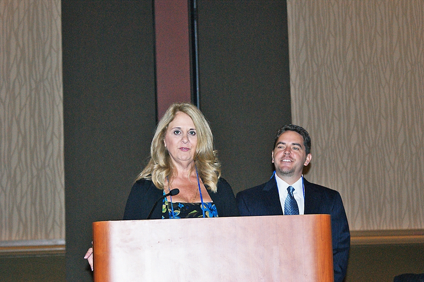 DSC03747.JPG - FL-ASCP President Janet Dallman (left) welcomes attendees on Saturday morning with FL-ASCP Executive Director Brad Kile looking on.