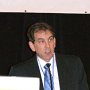 Dr. David LeVine introduces speakers during a morning lecture
