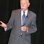 Dr. Leonard Hock addresses conference attendees during his morning lecture to kick off the annual conference.