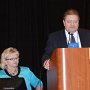 FMDA Chairman of the Board Dr. John Potomski (right) introduces speaker Polly Weaver (shown sitting)