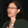 Dr. Laurie Jacobs talks to attendees at her session during the annual luncheon