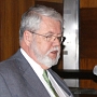 Dr. Alva Baker addresses attendees during his lecture